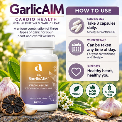 A bottle of Aim GarlicAIM Cardio Health dietary supplement is shown with garlic bulbs, garlic cloves, green leaves, and a white usage panel on a bright outdoor-style background. The bottle label is tan and purple, and the panel lists serving size, when to take, and benefits including vegan, non GMO, and gluten free.