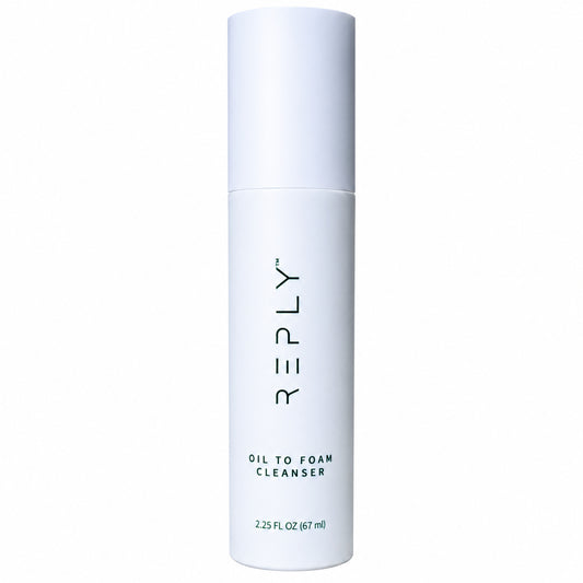 AIM Reply Oil to Foam Cleanser in a white bottle, 2.25 fl oz (67 ml), designed to cleanse skin by combining oil-based and foaming cleansing action.